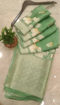 Pastel Green Zari Cow Motif Banarasi Silk Saree with Rich Pallu for Festive & Wedding Wear.