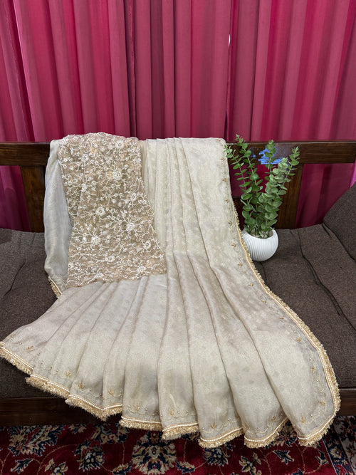 Champagne Beige Shimmer Saree with Heavy Sequin Embroidered Blouse for Reception & Party Wear.