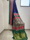 Blue & Green Bandhani Patola Art Silk Saree with Multicolour Animal Motifs & Zari Border for Festive & Wedding Wear.